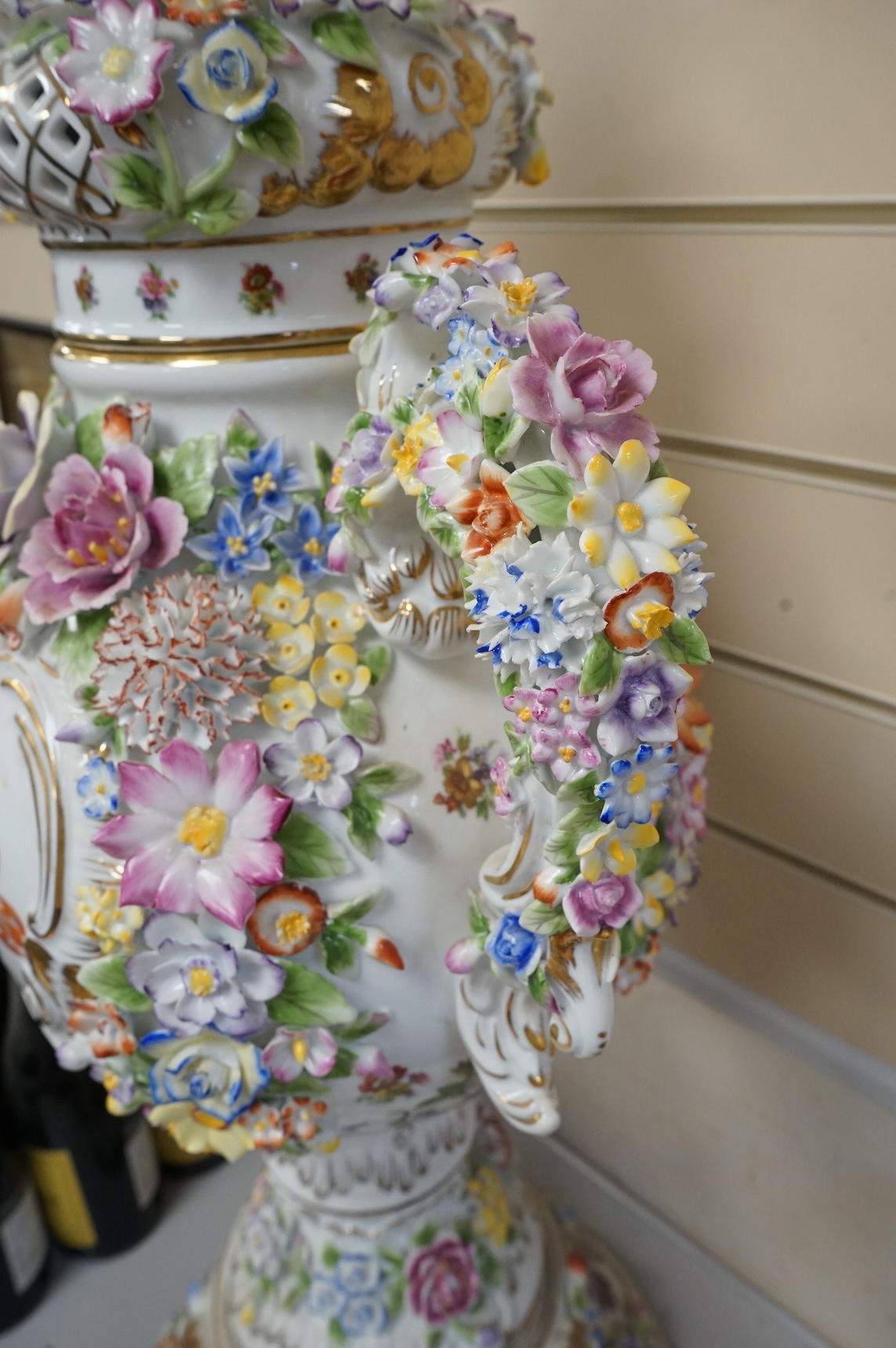 A large 20th century German porcelain two-handled pedestal vase and cover, 89cm